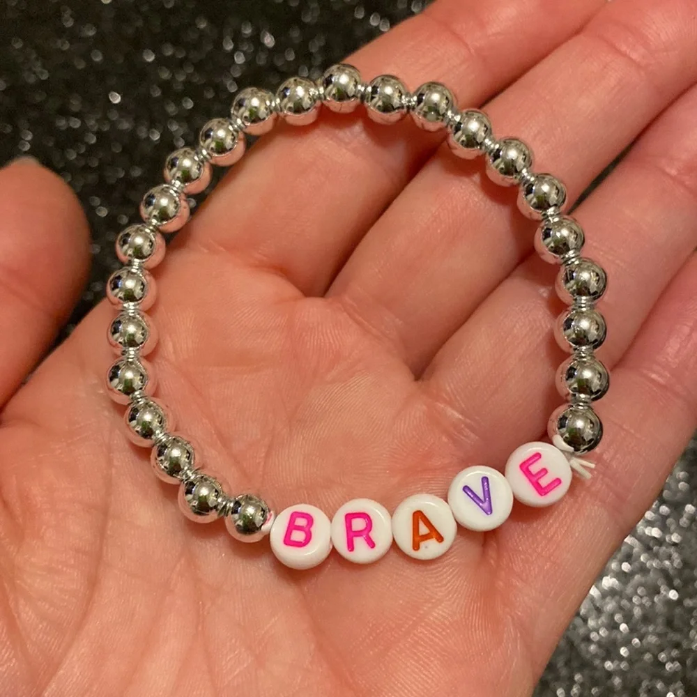 Girls faux silver beaded stretch brave bracelet
